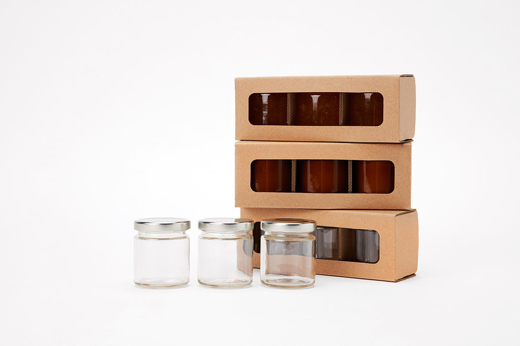Retail boxes and boxes with windows for glass jars available for purchase from Flush Packaging