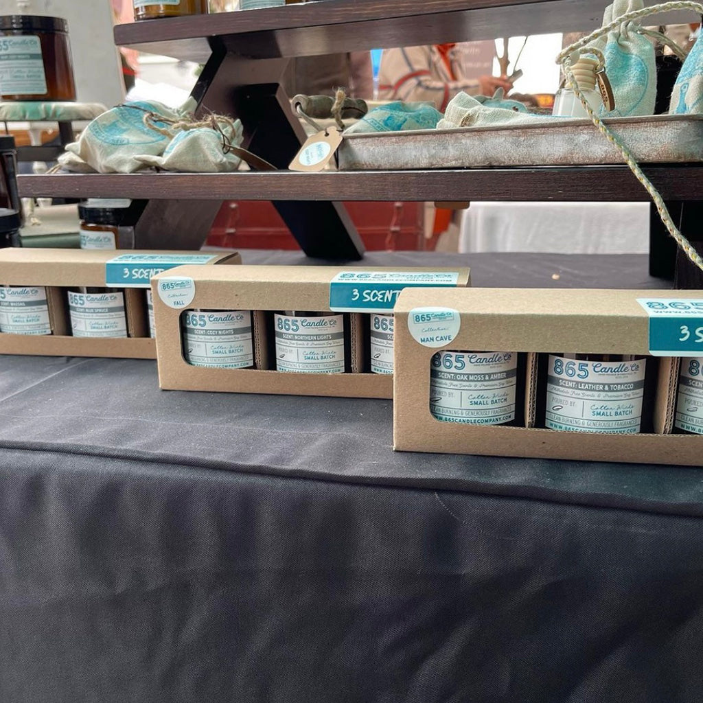 865 Candle Co candles packed inside the 4 oz Straight Sided Glass Jar 3-Pack Retail Box from Flush Packaging