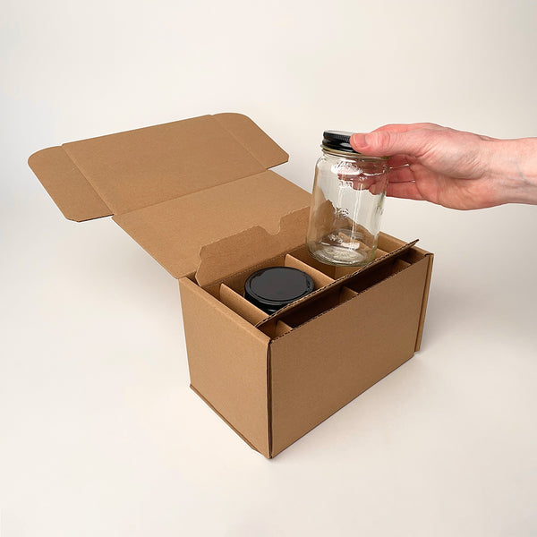 https://flushpackaging.com/cdn/shop/files/16-oz-Square-Mason-Jar-2-Pack-Shipping-Box-unboxing-4_600x.jpg?v=1692129106