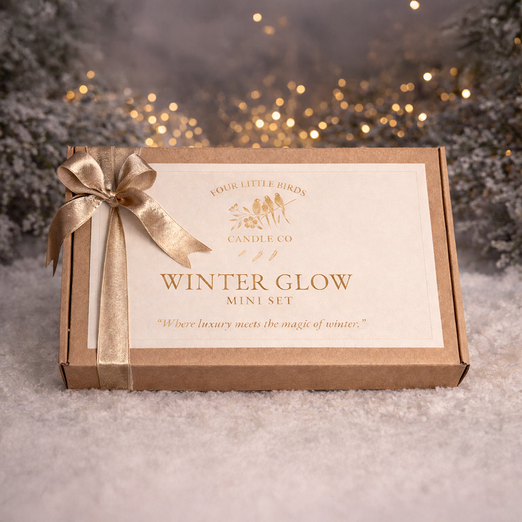 2 oz Candles from Four Little Birds Candle Co packaged with 2 oz Candle Tin Shipping Box from Flush Packaging