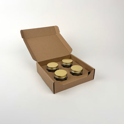2 oz Straight Sided Glass Jar 4-Pack Shipping Box for candle sample sets and discovery boxes available from Flush Packaging