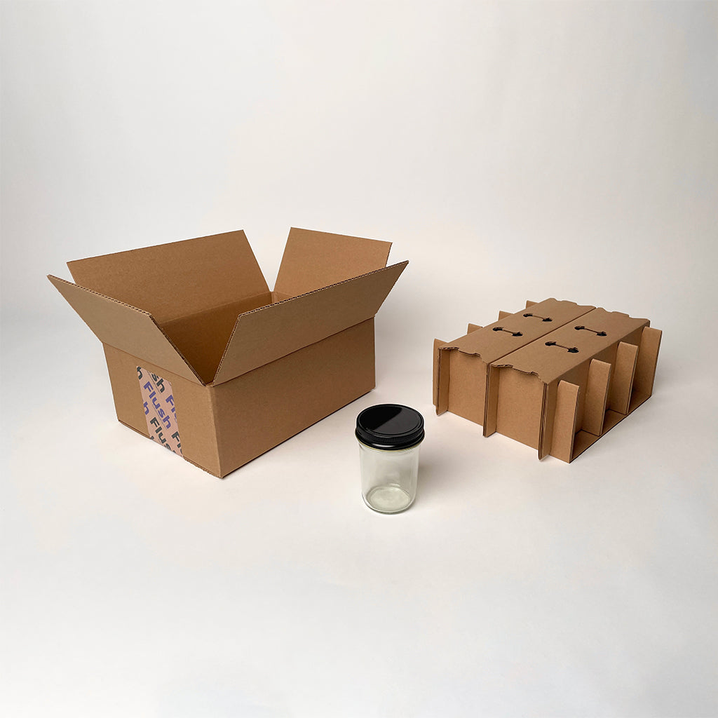 https://flushpackaging.com/cdn/shop/files/8-oz-Jelly-Jar-6-Pack-Shipping-Box-available-from-Flush-Packaging_1200x.jpg?v=1693442381