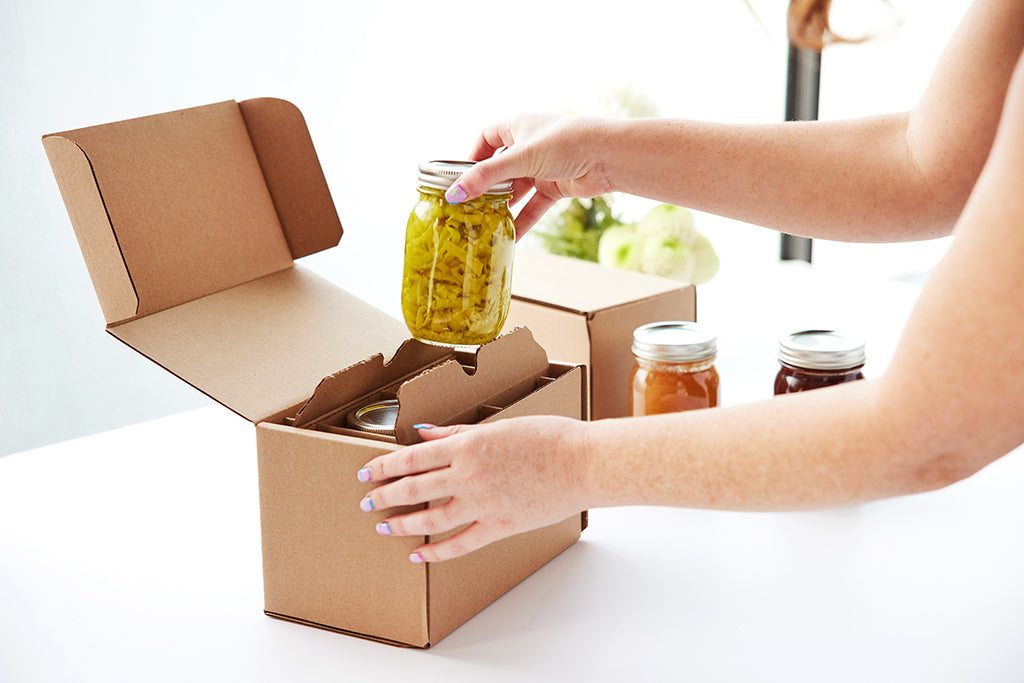 A Beautiful unboxing experience with protective shipping boxes available from Flush Packaging. Perfect for packing mason jars and glass jars safely wiithout bubble wrap or packing peanuts 