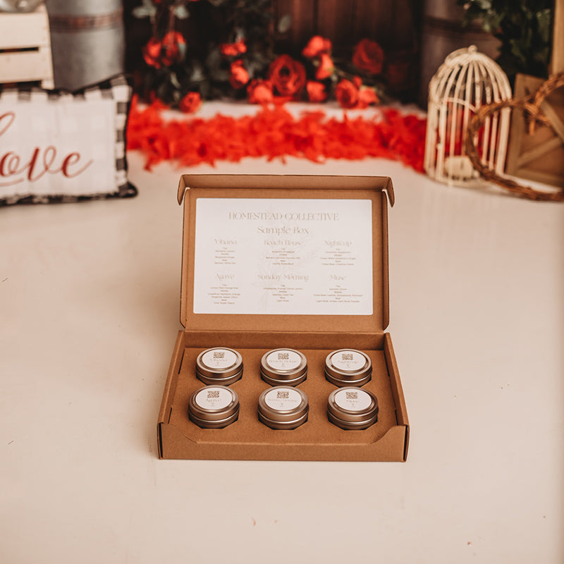 2 oz candle tins from Homestead Collective packed with the 2 oz Candle Tin 6-Pack Shipping Box from Flush Packaging. Perfect for candle discovery kits and candle sample packs