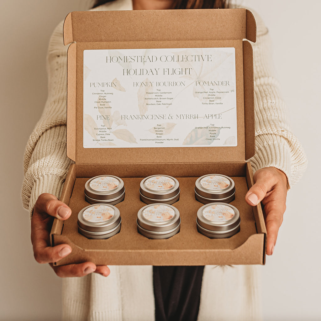 Holiday Candle Flight from Homestead Collective packed with 2 oz Candle Tin 6-Pack Shipping Box from Flush Packaging