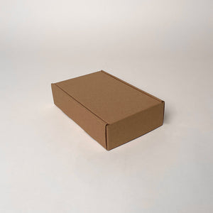Small Shipping Box for E-commerce businesses and perfect for shipping small items with USPS. Available for purchase from Flush Packaging