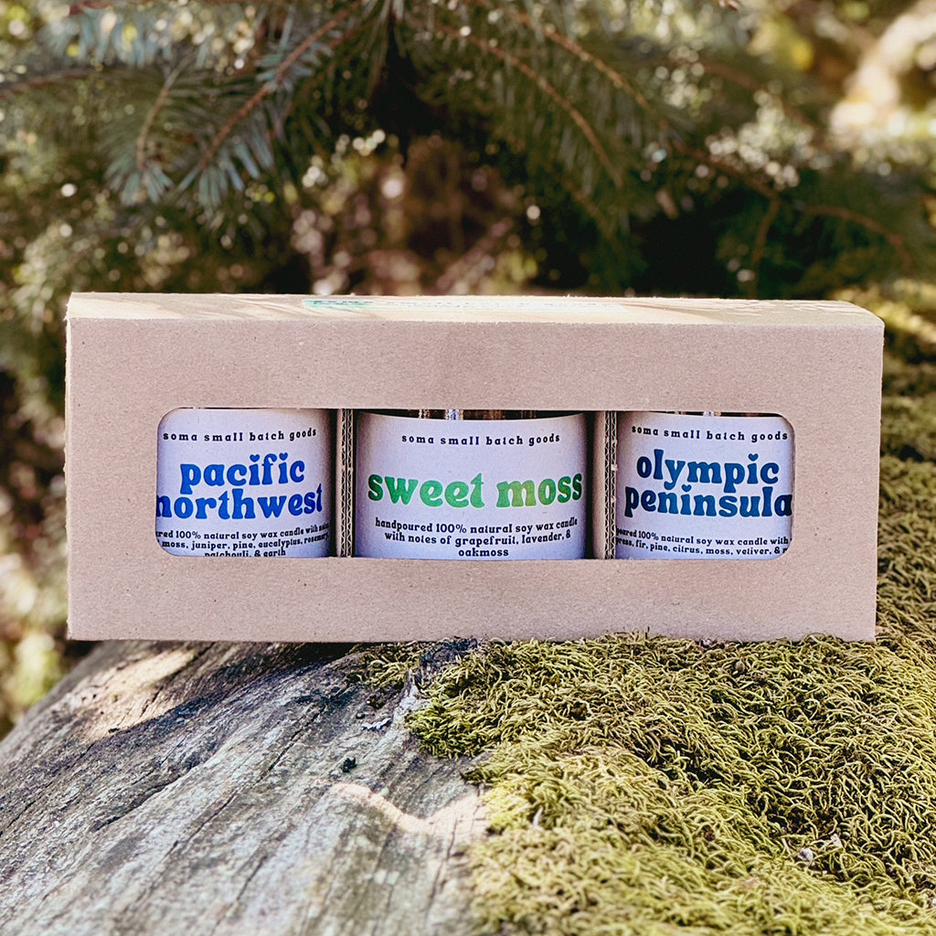 Candles from Soma Small Batch Goods packaged with the 9 oz Straight Sided Glass Jar 3-Pack Retail Box from Flush Packaging